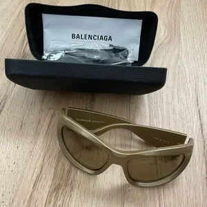 Balenciaga D Frame Wrap Sunglasses in Gold - As seen on Kim Kardashian The Sporty Sunglasses Co-opted by Fashion and Fascism  main image 4